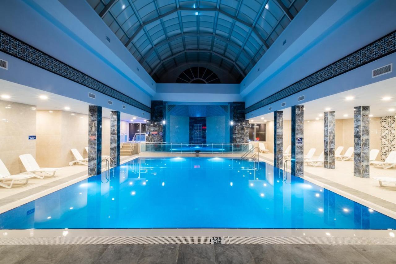 Spa Hotel Colossae Thermal Karahayit  Esterno foto The swimming pool at the hotel