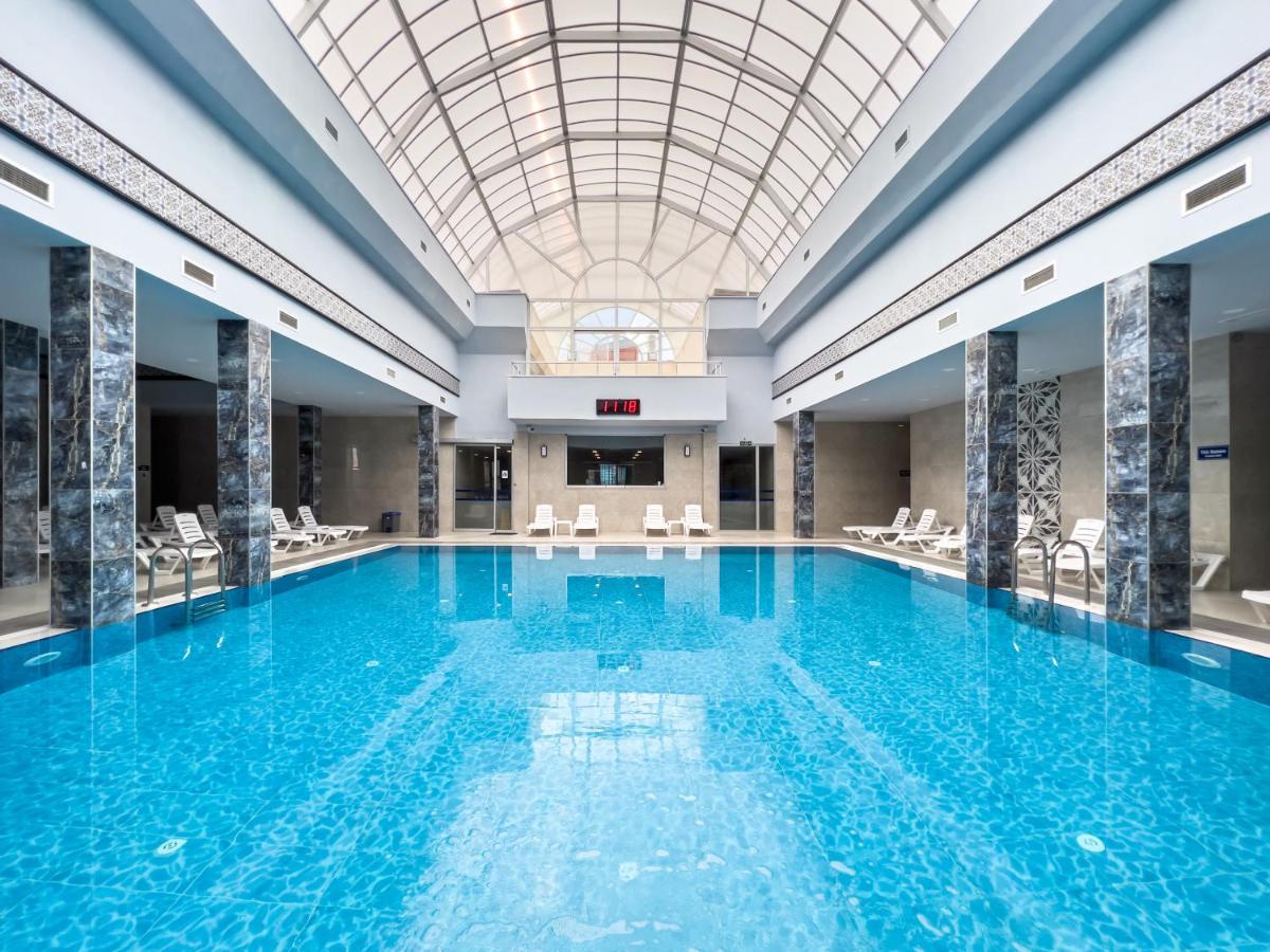 Spa Hotel Colossae Thermal Karahayit  Esterno foto The swimming pool at the hotel