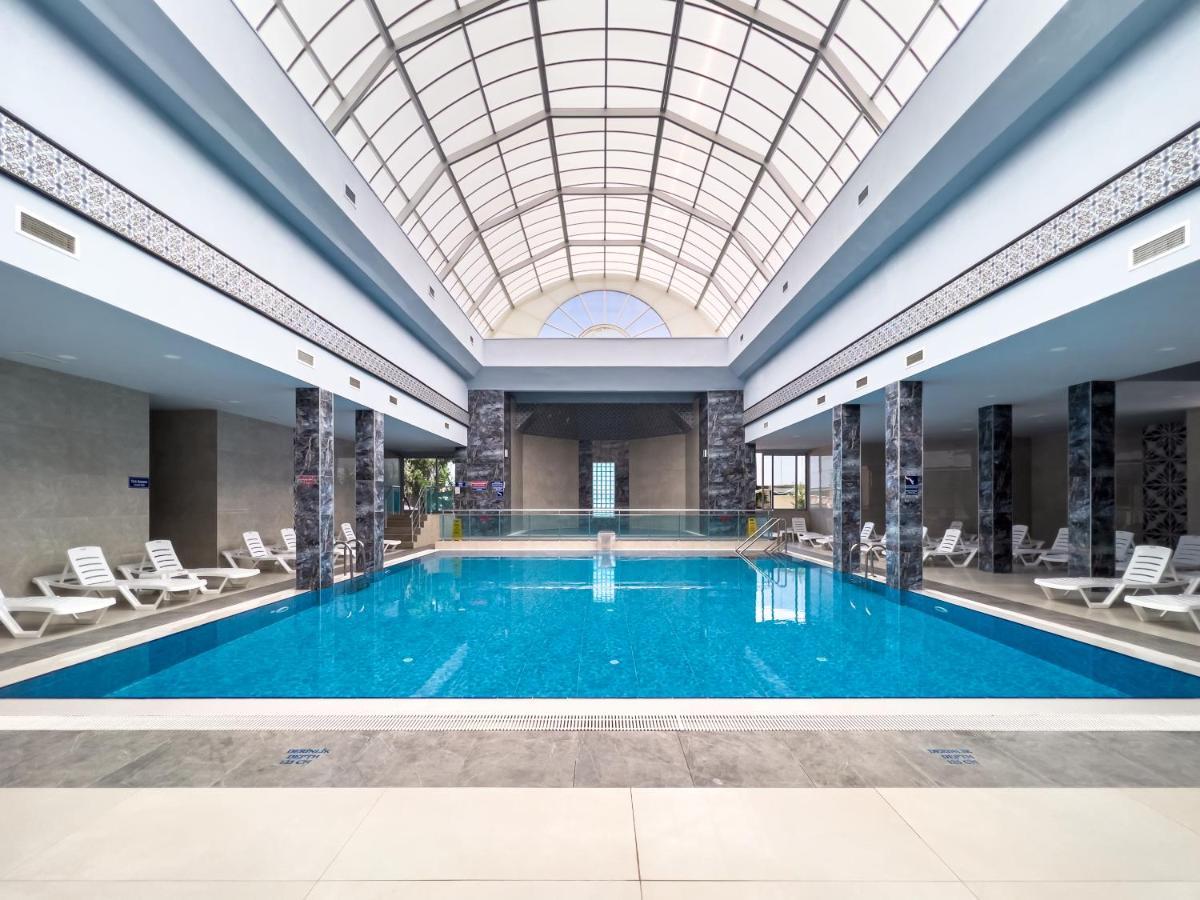Spa Hotel Colossae Thermal Karahayit  Esterno foto The pool at the hotel